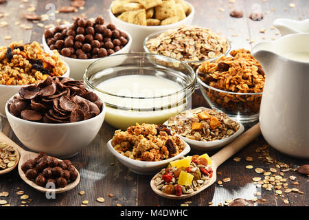 Composition with different sorts of breakfast cereal products. Stock Photo