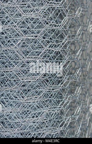 Steel metal mesh chicken wire roll Stock Photo - Alamy