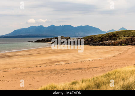 Isle of Skye as seen from a beach on Isle of Rum Stock Photo