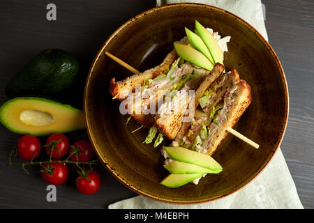 Top view of Healthy Sandwich toast with lettuce, ham, cheese and tomato on a wooden background Stock Photo