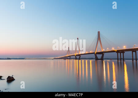 cable-stayed bridge in nightfall Stock Photo