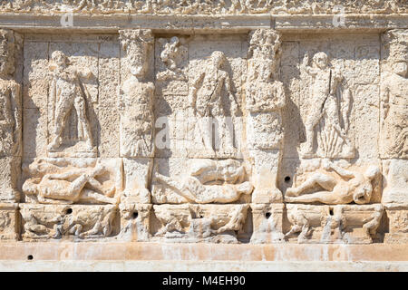 The greek fountain is located in Gallipoli, near the bridge that connects the new town to the old town. This fountain is the oldest in Italy, and is s Stock Photo