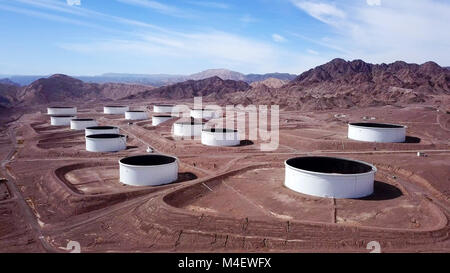 Large white tanks for crude oil storage - Aerial image Stock Photo