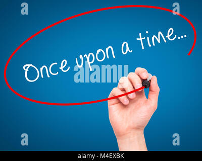 Man Hand writing Once upon a time Stock Photo