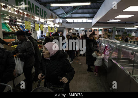 Chris Huby / Le Pictorium -    -  02/02/2018  -  France / Yvelines (french department) / Trappes  -  France - Trappes - Muslim Women at the weekly MARCHE DES MEURISIERS - The city of Trappes is the embodiment of a paradox: at the same time place of origin of the most popular French actor in 2017, Omar Sy, symbol of integration, and place of departure of 67 trappists fighting in the Islamic State in the Levant (ISIS / DAESH), symbol of rupture. In addition, she holds the European record for starting jihad. Stock Photo