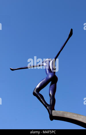 Upright view Spofforth sculpted  figure against deep blue sky Stock Photo