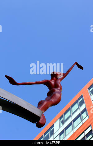 Upright view Spofforth sculpted  figure against deep blue sky Stock Photo