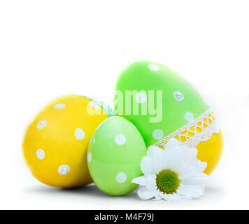 Easter eggs and spring flower decoration on white Stock Photo