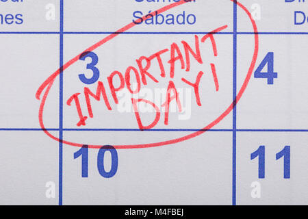 Close-up Of Important Day Reminder Written On Calendar Stock Photo