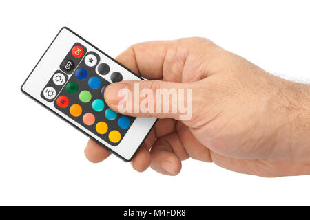 Remote control for change colors in hand Stock Photo