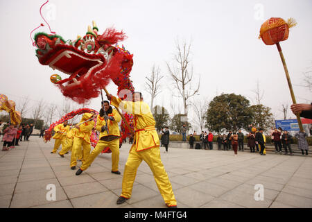 Bozhou, China's Anhui Province. 16th Feb, 2018. Farmers perform dragon dance in Mengcheng County, east China's Anhui Province, Feb. 16, 2018. People held different activities to celebrate Chinese Lunar New Year all over China. Credit: Hu Weiguo/Xinhua/Alamy Live News Stock Photo