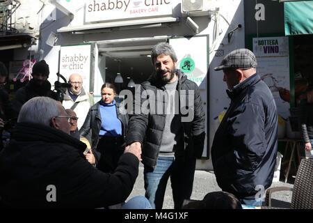 In the photo the on. roberto Fico of the Five Star Movement among the people. 16th Feb, 2018. This morning one of the national leaders of the Five Star Movement created by the comedian Beppe Grillo, during the electoral campaign for the 2018 policies in Italy, walked among the people distributing flyers with the M5S electoral program to the Virgin market in the popular health district in the center of Naples Credit: Fabio Sasso/ZUMA Wire/Alamy Live News Stock Photo