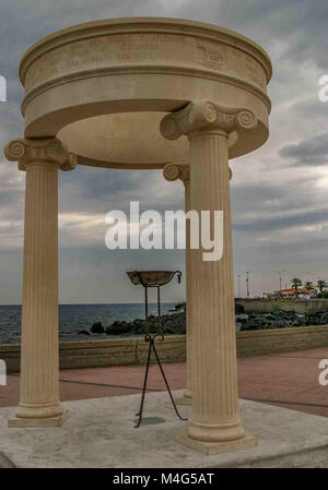 Giardini Naxos, Sicily, Italy. 12th Oct, 2004. A monument in Giardini Naxos, Sicily, commemorating the Olympic fire of the 1960 Summer Olympics held in Rome, Italy. Sicily has become a popular tourist destination. Credit: Arnold Drapkin/ZUMA Wire/Alamy Live News Stock Photo