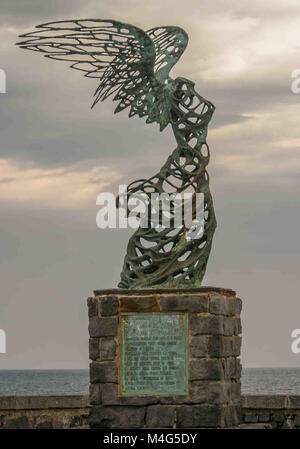 Giardini Naxos, Sicily, Italy. 12th Oct, 2004. A statue representing Nike, Goddess of Victory, by Carmelo Mendola, stands in the seaside resort town of Giardini Naxos, Sicily, Italy, overlooking the Ionian Sea. Sicily has become a popular tourist destination. Credit: Arnold Drapkin/ZUMA Wire/Alamy Live News Stock Photo