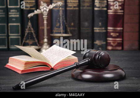 Law and Justice, Legality concept, Scales of Justice and Judge Gavel on a black wooden background. Stock Photo