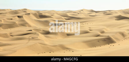 Big sand dunes panorama. Desert or beach sand textured background. Stock Photo