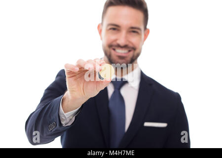 Happy businessman holding coin template, isolated on white background Stock Photo