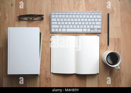 Office desktop mockup from above. Clean background with empty copy space for Editor's text. Stock Photo