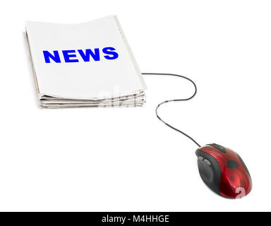 Stack of newspapers News and computer mouse Stock Photo