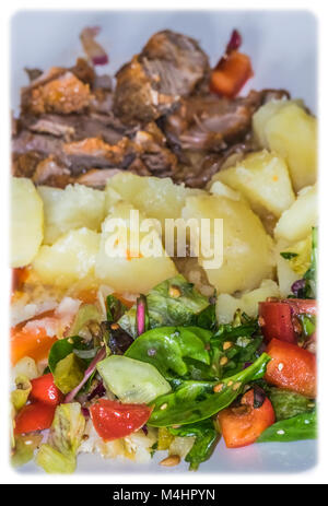 Pulled pork and potatoes meal Stock Photo