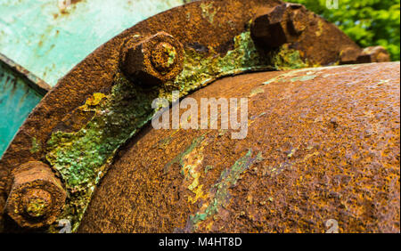 old rusty pipe with bolts Stock Photo