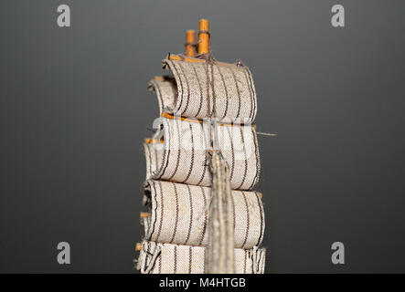Sail on miniature sailing ship, close up Stock Photo