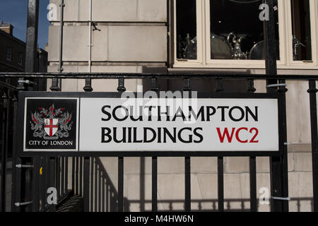 street name sign for southampton buildings, with a city of london coat of arms, london, england Stock Photo