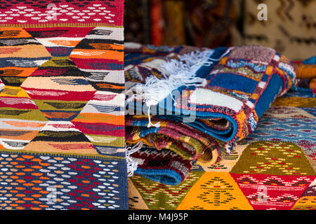 Colorful Moroccan traditional handmade carpets with decorative patterns Stock Photo