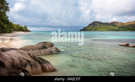 Beach and Rocks, Praslin, Seychelles Stock Photo