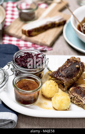 Homemade Beef roulade with red cabbage and potato dumplings Stock Photo