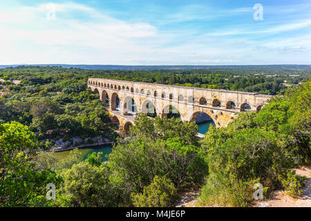 Three-tiered aqueduct Pont du Gard and natural park Stock Photo