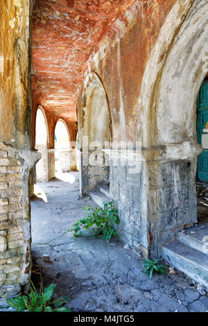 old building with arches summer day Stock Photo