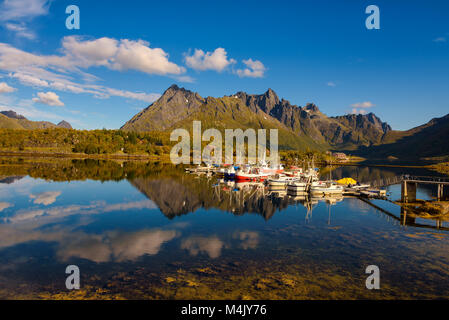 Fishing boats and yachts on Lofoten islands in Norway Stock Photo