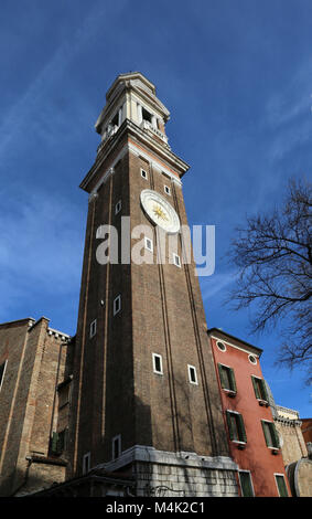 Ancinet bell tower with big clock of the Church of SANTI APOSTOLI in Venice Italy Stock Photo