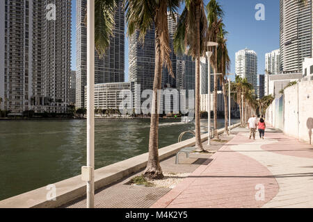 People walking along waterfront in downtown Brickell, Miami, Florida, USA Stock Photo