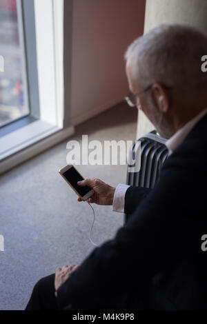Businessman using a smart phone Stock Photo
