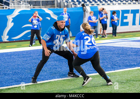 Detroit, Michigan - Detroit Lions safety Miles Killebrew runs students through football drills during a physical activity and nutrition program at For Stock Photo