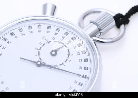 analogue metal stopwatch on the white background Stock Photo - Alamy
