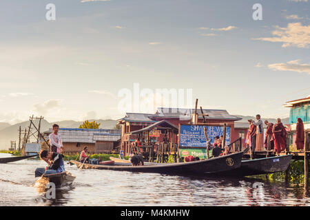 Maing Thauk: wooden bridge into Inle Lake, boat, Inle Lake, Shan State, Myanmar (Burma) Stock Photo