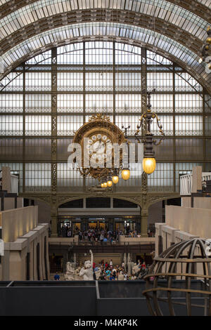 PARIS -SEPTEMBER 7, 2014: Golden clock of the museum D'Orsay in Paris, France. Musee d'Orsay has the largest collection of impressionist and post-impr Stock Photo