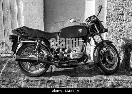 Old BMW motorcycle parked on its stand. Stock Photo