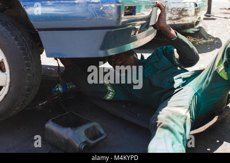 Mechanic repairing a car Stock Photo