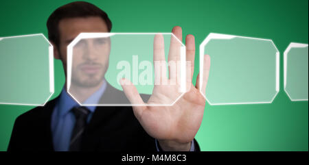 Composite image of close up of businessman touching palm on invisible interface Stock Photo