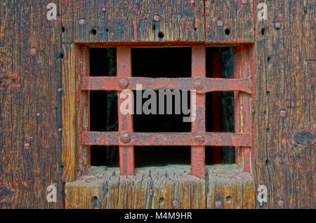 The old jailhouse door in Cimarron, New Mexicois pretty sturdy! Stock Photo