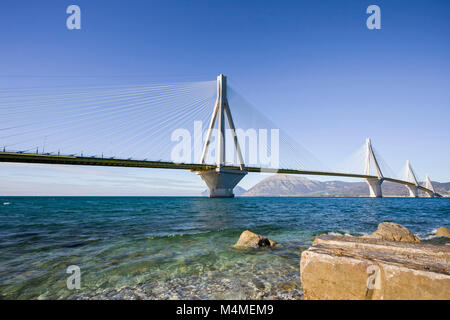 distant view of suspension bridge Rio - Antirio near Patra, Greece Stock Photo