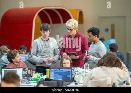 students and young adults studying and socialising Stock Photo