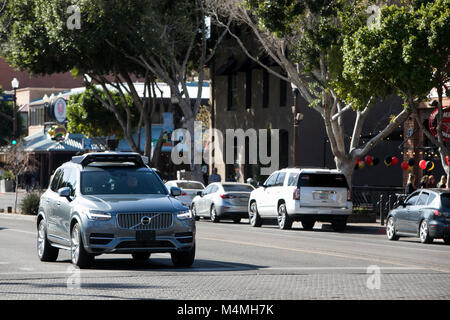 An Uber self-driving autonomous vehicle seen driving in Tempe, Arizona on February 3, 2018. Stock Photo