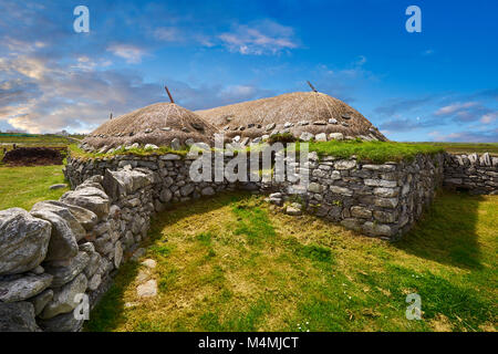 Picture & image of the exterior with stone walls and thatched roof of The historic Blackhouse, 24 Arnol, Bragar, Isle of Lewis, Scotland. Stock Photo