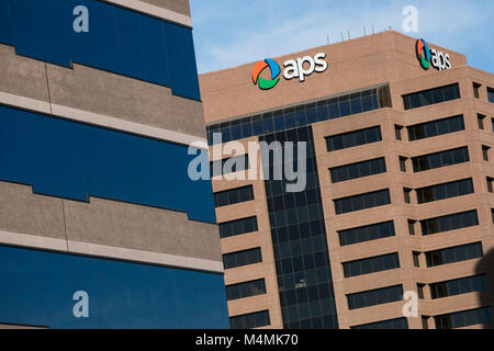 A logo sign outside of the headquarters of Arizona Public Service (APS) in Phoenix, Arizona, on January 30, 2018. Stock Photo