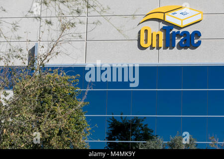 A logo sign outside of the headquarters of OnTrac in Chandler, Arizona, on February 3, 2018. Stock Photo